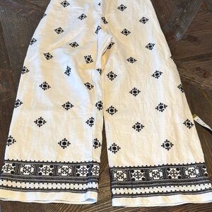 Magaschoni White Wide-Leg Pants with Black Embroidered Motif